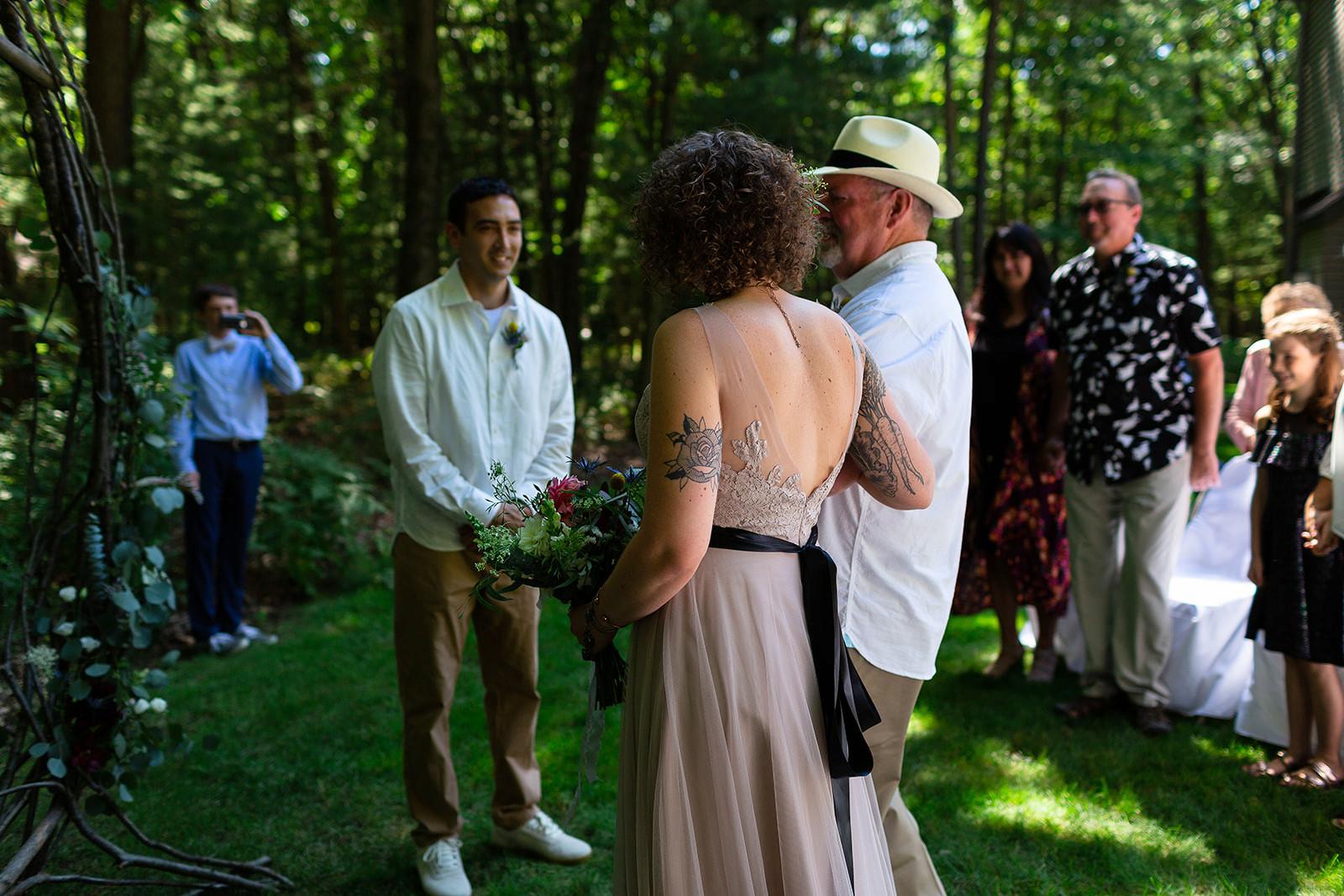 JS Weddings and Events, a Grand Rapids Wedding Planner and Floral Designer. A Moody Bohemian Romantic Nature Inspired Summer Wedding in Northern Michigan